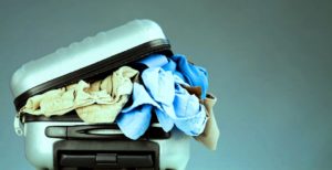 overstuffed suitcase